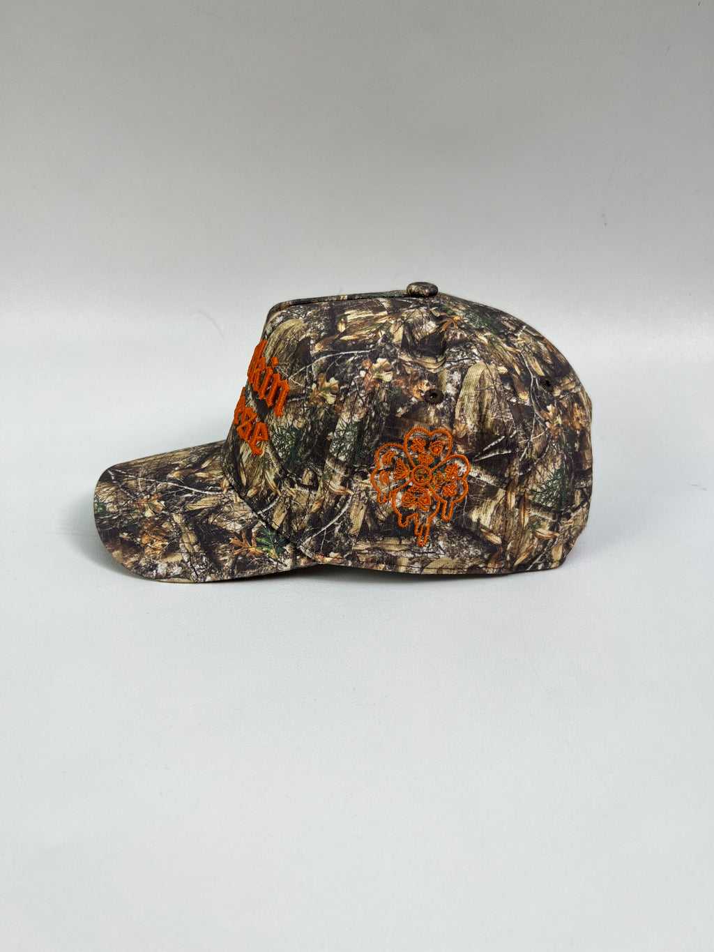 CAMO/ ORANGE SNAPBACK