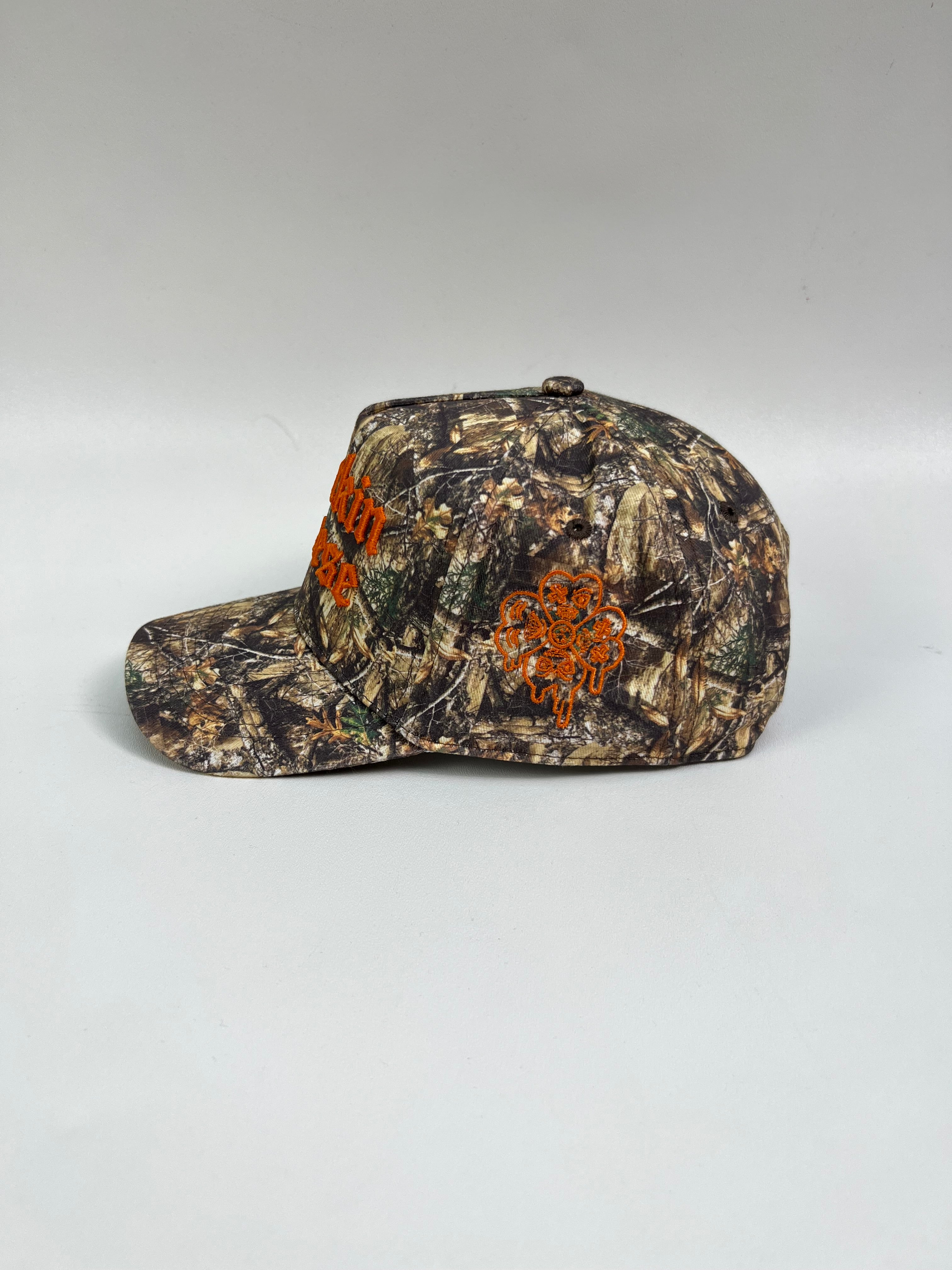 CAMO/ ORANGE SNAPBACK